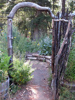 handmade, wooden gate to pathway